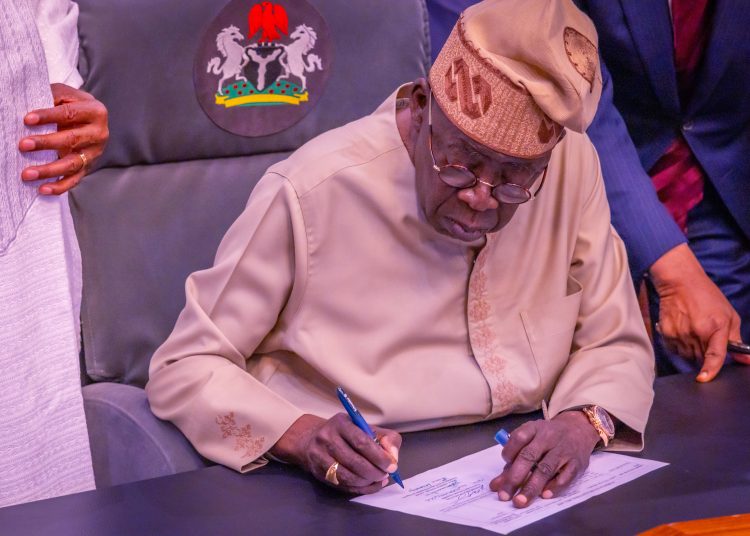 Tinubu signs amended electoral Act